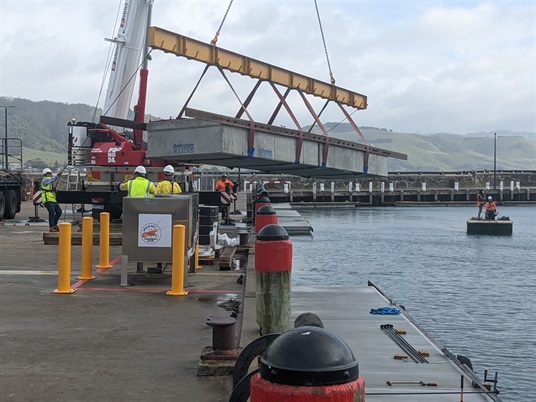 lifting section into water at low landing - 20221212.JPG
