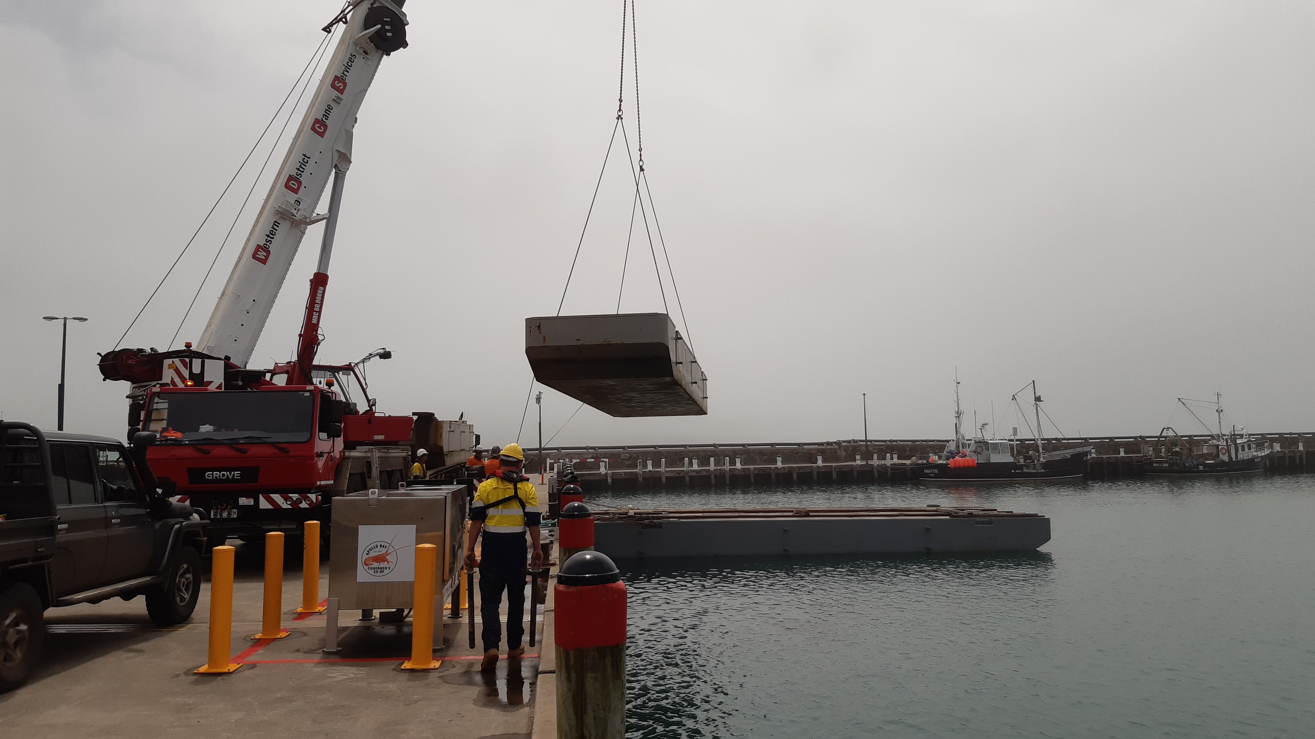 crane unloading barges.JPG